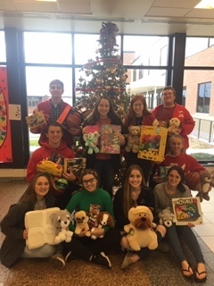 Members of the National Honor Society were spreading Christmas Cheer by collecting Christmas gifts to donate to our local Love INC